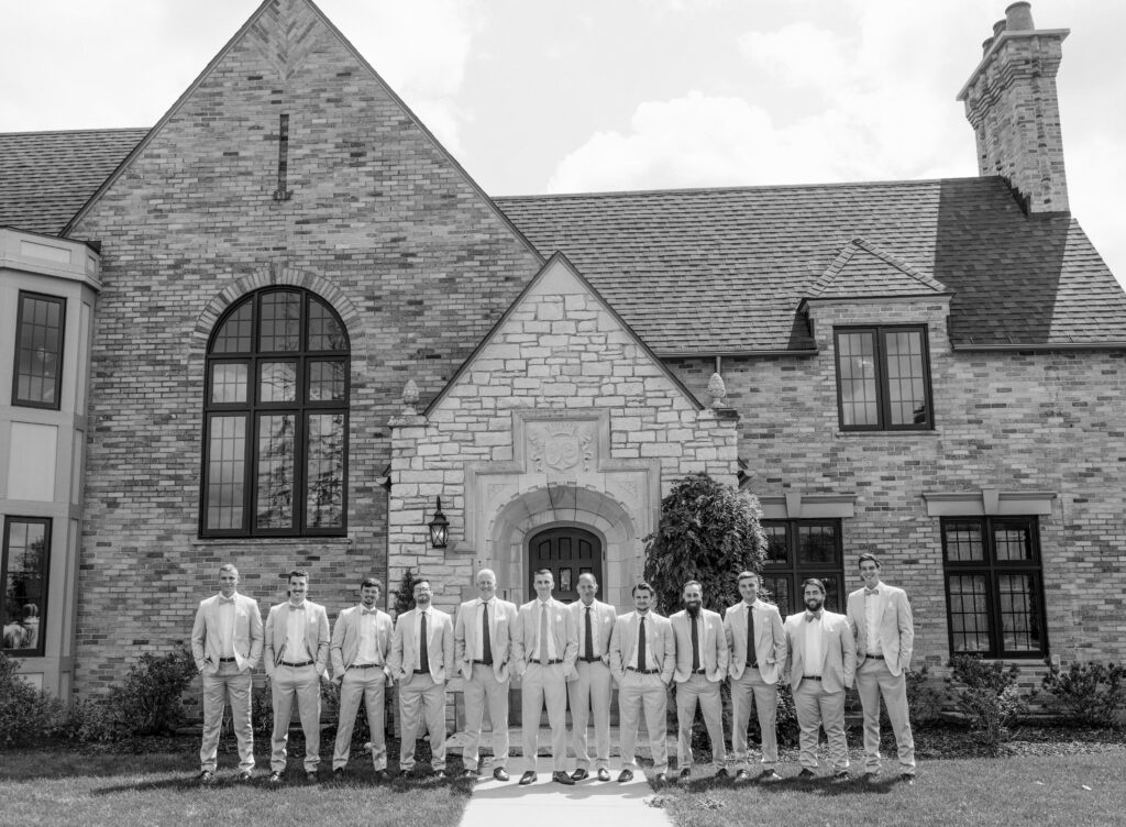 black and white photograph of groom and groomsmen at Venue3Two