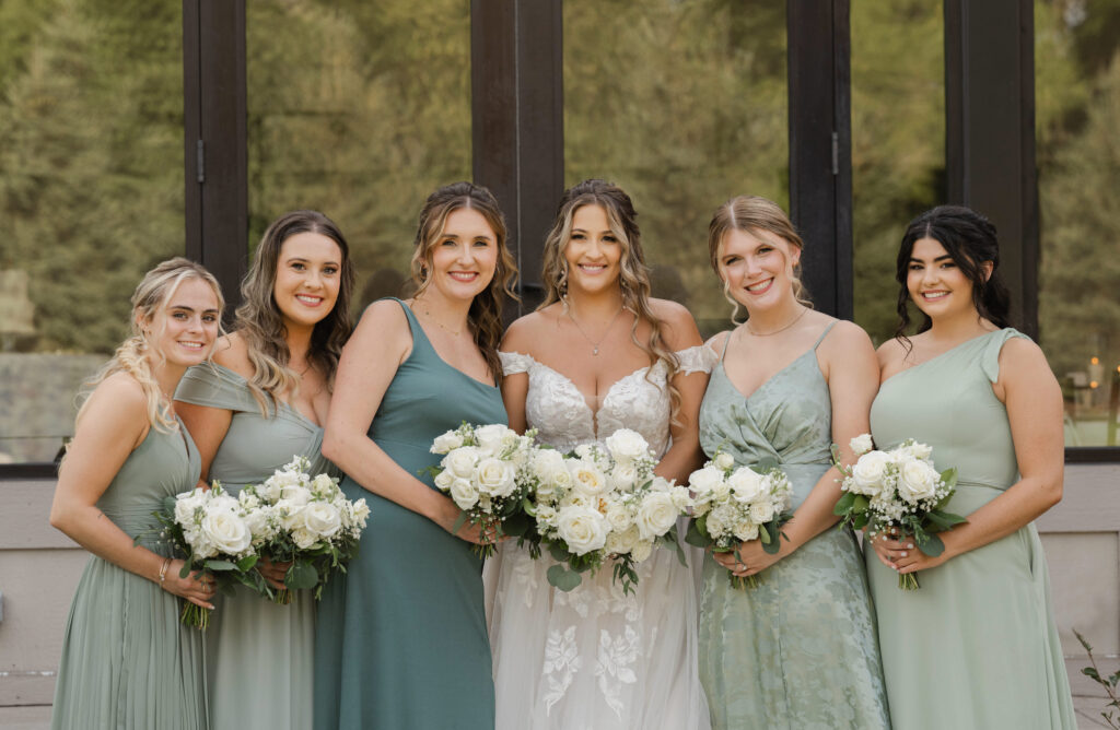 bridesmaids in sage green taken by Kelly Jo Photography at Venue3Two